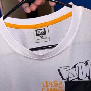 Stylish White Top with Orange Trim